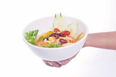 Salads, vegetables and fruit in a bowl. Ready to serve for everyone.の写真素材