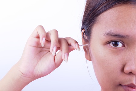 Women are cleaning the inside their ears.の写真素材