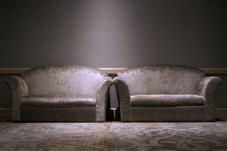 Leather sofa in the room with light.の写真素材