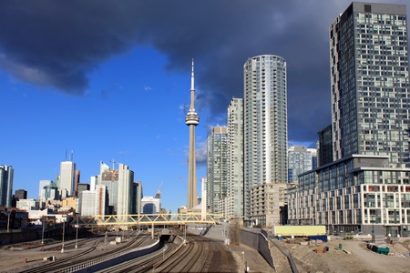 View of downtown Toronto and CN Tower with railway tracksのeditorial素材