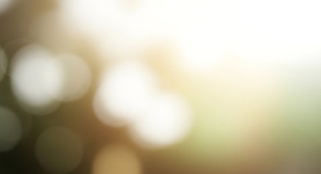 Abstract background with soft, diffused circles of light creating a peaceful and ethereal mood.の素材