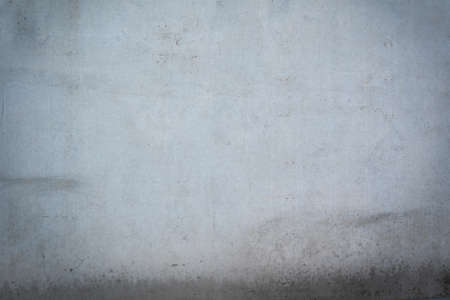 smooth dirty concrete wall background texture with stainsの写真素材