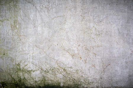 cracked concrete background wall old damaged texture templateの写真素材