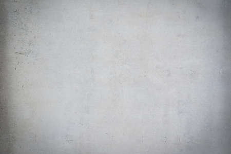 smooth concrete background texture with small cracks and stainsの写真素材