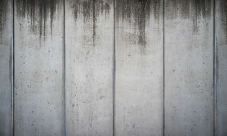 dirty leaking concrete stone wall texture backgroundの写真素材