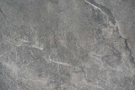 Gray natural stone wall textured. architecture background. Concrete structure material.の写真素材