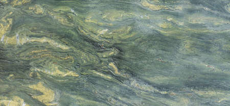 abstract green natural stone marble texture background with copy space and yellow tonesの写真素材