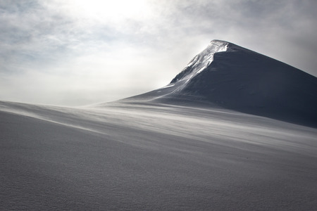 Spaghetti round in the Alps, Monte Rosa Massif, Italy. Panoramic view of a snow and ice covered mountain on an alpine tourの写真素材