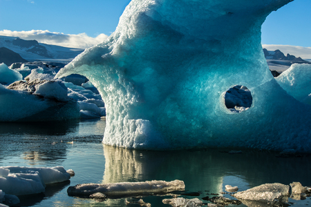 Beautiful blue colored iceberg in the Jokulsarlon Glacier Lagoon, Icelandの写真素材