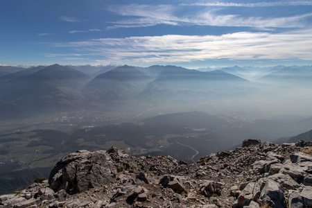View down to the Innvalley in Austria in autumn as seen from the side of the mountain Hundskopf in the Karwendel Mountains, European Alpsの写真素材