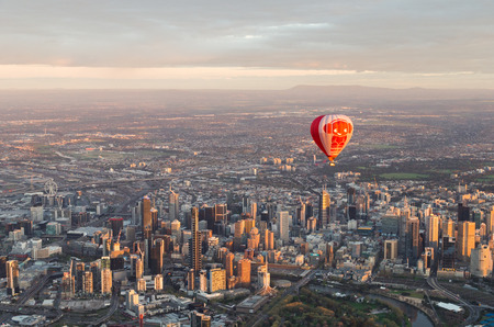Melbourne, Australia - September 15, 2013: a hot air balloon floating over the central business districtのeditorial素材
