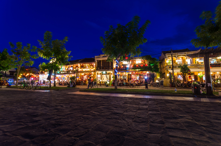 Hoi An, Vietnam - August 14, 2015: restaurants and shops on the banks of the Thu Bon river on Nguyen Phuc Chu in Hoi An at night.のeditorial素材