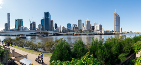 Brisbane, Australia - July 9, 2017: Brisbane skyline, Brisbane River, the Victoria Bridge and the Riverside Expressway seen from the South Bank.のeditorial素材
