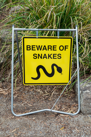 Beware of snakes warning sign in suburban Eltham in Melbourne, Australiaの写真素材