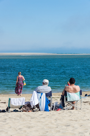 Inverloch, Australia - January 27, 2018: Beachgoers on Inverloch beach, a popular seaside holiday town in South Gippsland.のeditorial素材