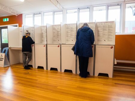 Melbourne, Australia - November 19, 2017: Voters participating in the 2018 Victorian state election at Antonio Park Primary School in Mitcham.のeditorial素材