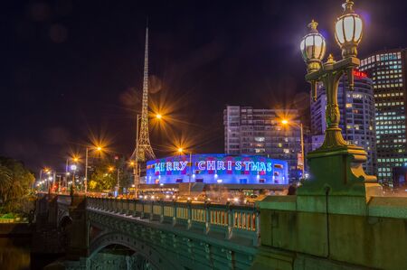 Melbourne, Australia - December 22, 2017: Christmas message on Hamer Hall, a concert hall on the south bank of the Yarra River in central Melbourne. Princes Bridge is in the foreground.のeditorial素材