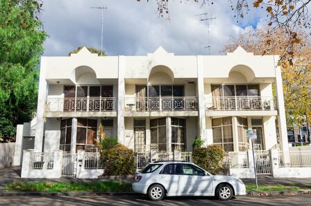 Melbourne, Australia - June 9, 2019: attached townhouses in O'Shanassy Street in North Melbourne in inner urban Melbourne.のeditorial素材