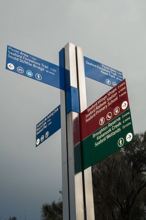 Melbourne, Australia - August 10, 2019: signpost on the Seaford foreshore in suburban Melbourne. It...