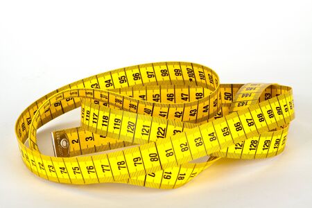 yellow measure tape with scale in centimetersの写真素材
