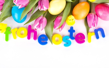tulip wit eastern eggs a rabbit and letters in different coloursの写真素材