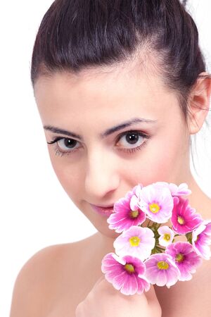 young beautiful brunette woman with flowerの写真素材