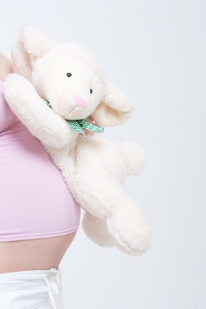 older pregnant woman looks forward to her babyの写真素材