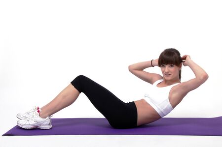 young beuatiful woman is doing workout の写真素材