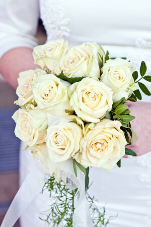 beautiful bridal bouquet of white roses weddingの写真素材
