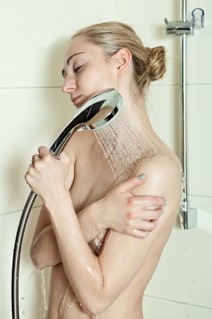 woman is taking a shower and relaxingの写真素材