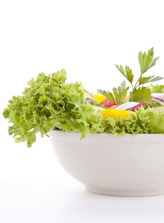 fresh tasty healthy salad with different vegetables isolated on white backgroundの写真素材
