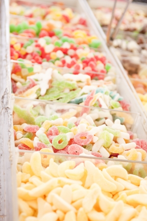 delicious assortement of sweets and jellybeans on marketの写真素材