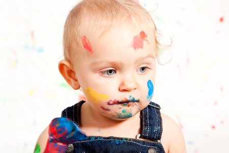cute little toddler baby colorful creative art paint happyの写真素材