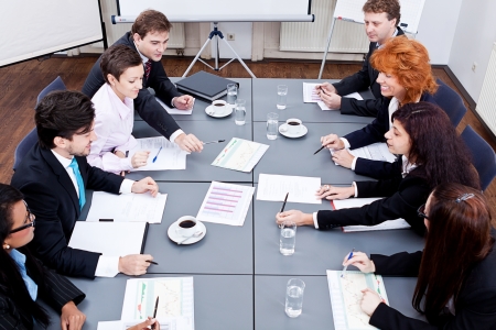 business team on table in office conference seminar presentationの写真素材
