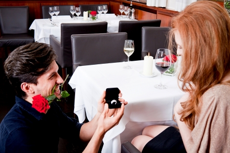 happy couple in restaurant romantic date love dinner valentines day weddingの写真素材