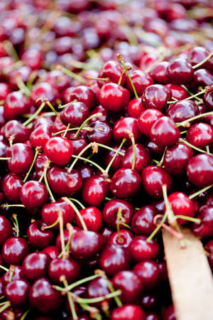 sweet red cherry closeup macro on market outdoor summer