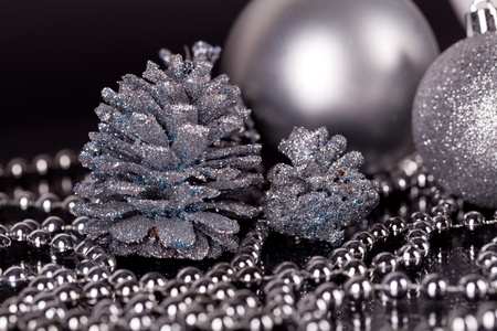 christmas decoration in grey silver glamour on black backgroundの写真素材