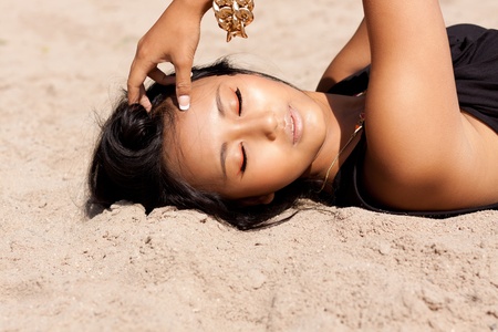beautiful asian woman with colorful makeup on the beach portrait summer beautyの写真素材