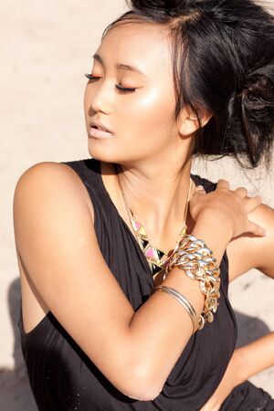 beautiful asian woman with colorful makeup on the beach portrait summer beauty