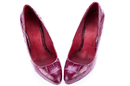 red stylish leather high heels shoes stilettos isolated on white の写真素材