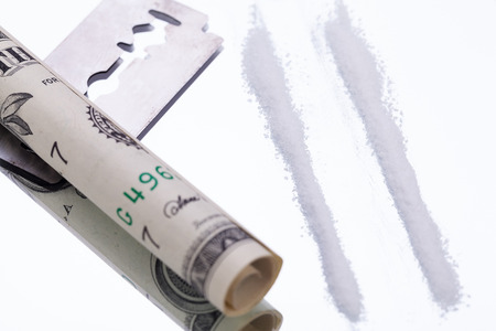 cocaine lines on mirror with razor blade drugs objects macro closeupの写真素材