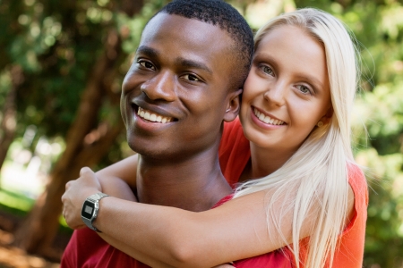 young couple in love summertime fun happiness romance outdoor colorfulの写真素材