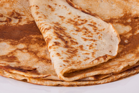Delicious Pancakes on Plate Served, Isolated on White Wooden Table