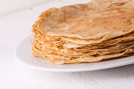 Delicious Pancakes on Plate Served, Isolated on White Wooden Tableの写真素材