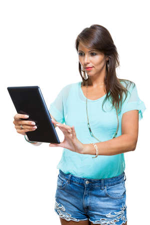 Close up Pretty Young Woman Browsing at her Black Tablet Computer, Isolated on White Background.の写真素材