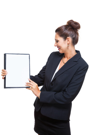 Half Body Shot of a Young Businesswoman Showing a Clean White Document with Copy Space, Isolated on White Background.の写真素材