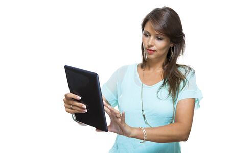 Close up Pretty Young Woman Browsing at her Black Tablet Computer, Isolated on White Background.の写真素材
