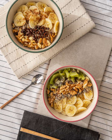 A top view of two bowls with porridge.の写真素材