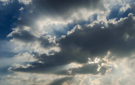 Sunset with sun beams on the sky is overcast,sun rays