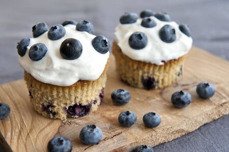 Delicious blueberry muffins and vegan frostingの写真素材